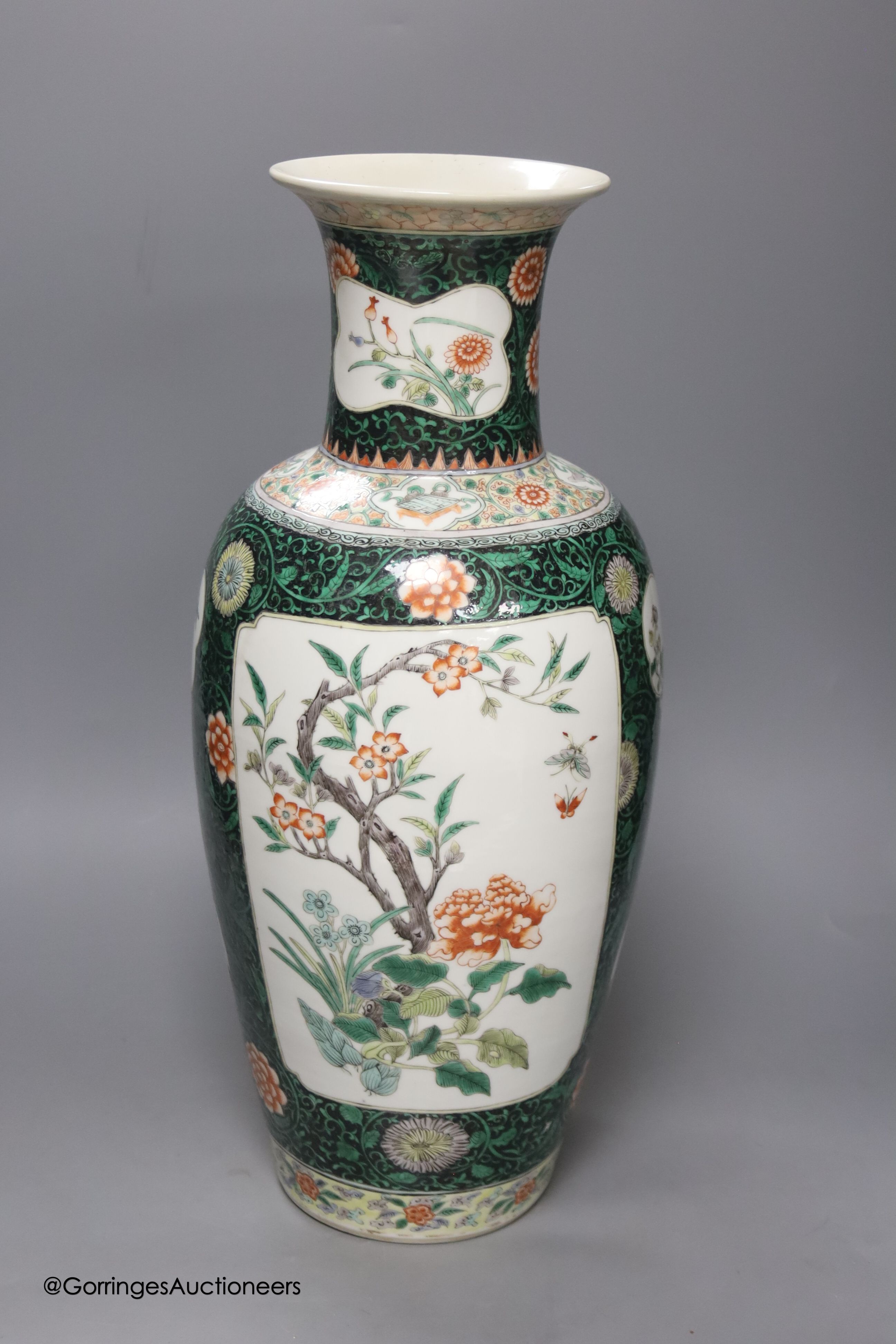 A large 19th century Chinese famille noire vase, height 46cm, restored neck